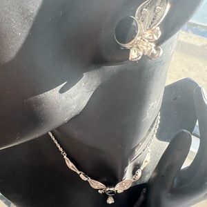 Set of antique sign by Espo Flex screw earring and necklace.